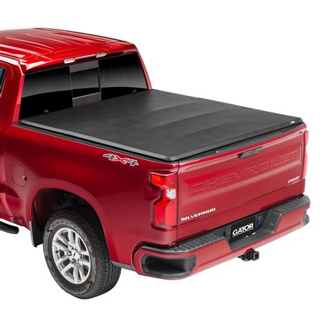 Gator ETX Tri-Fold Tonneau Cover Gator EFX Hard Tri-Fold Gator FX Hard Quad-Fold Gator Recoil Retractable ; STYLE : Soft roll up - cover rolls up 100% of the way toward the cab of the truck : Soft tri-fold - cover folds up 2/3 of the way toward the cab of the truck : Hard tri-fold - cover folds up 2/3 of the way toward the cab of the truck . Gator etx soft tri fold truck bed tonneau cover